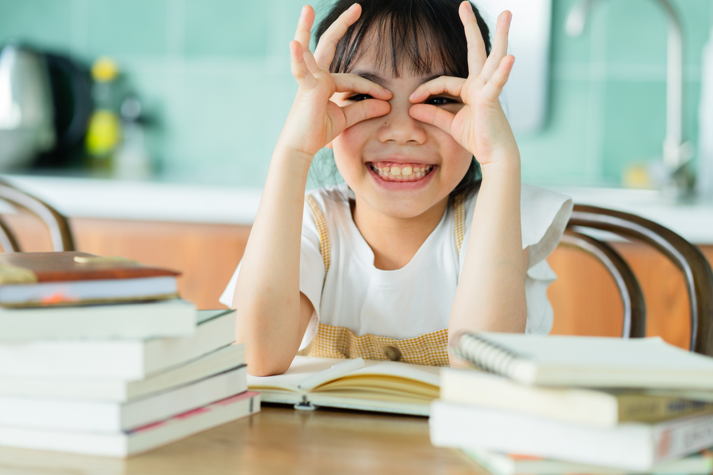 Asian Child Studying at Home