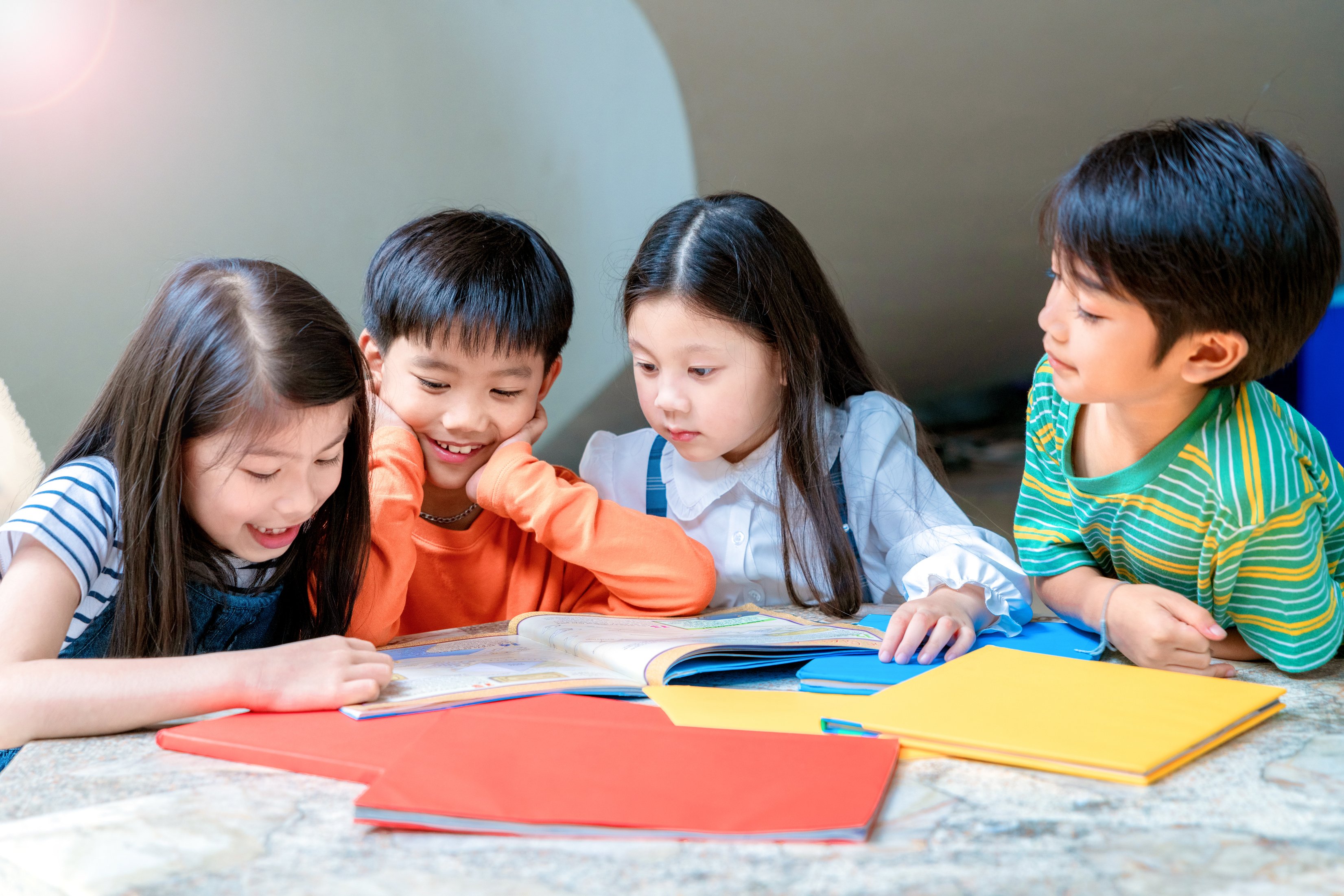 Asian Little Children Reading Book Cheerful